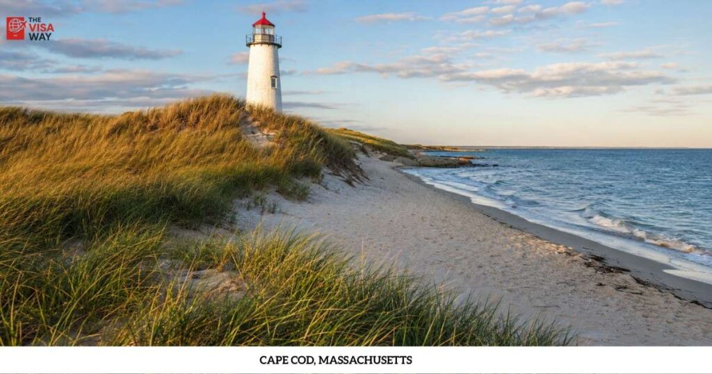 Lighthouse overlooking a sandy beach and ocean at Cape Cod, Massachusetts