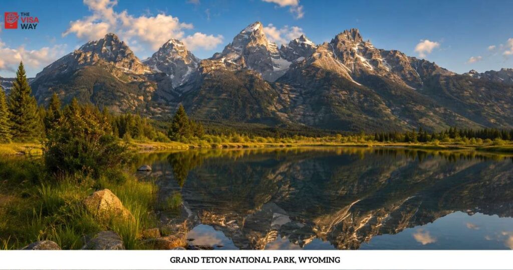 Grand Teton National Park in Wyoming with rugged mountains reflected in a calm lake
